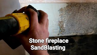 Sandblasting a stone Fireplace