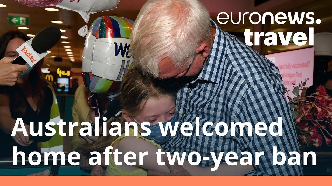 Australians in tears as travellers return home after two-year travel ban
