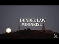 The moon rising over the dundee law