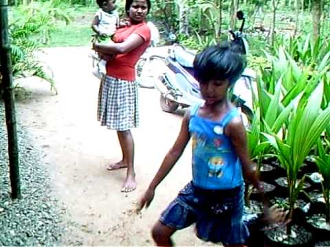 Sri Lanka Little Girl Funny Dance, Medagama, Thambagalla Watta, Chilaw, Sri Lanka.
