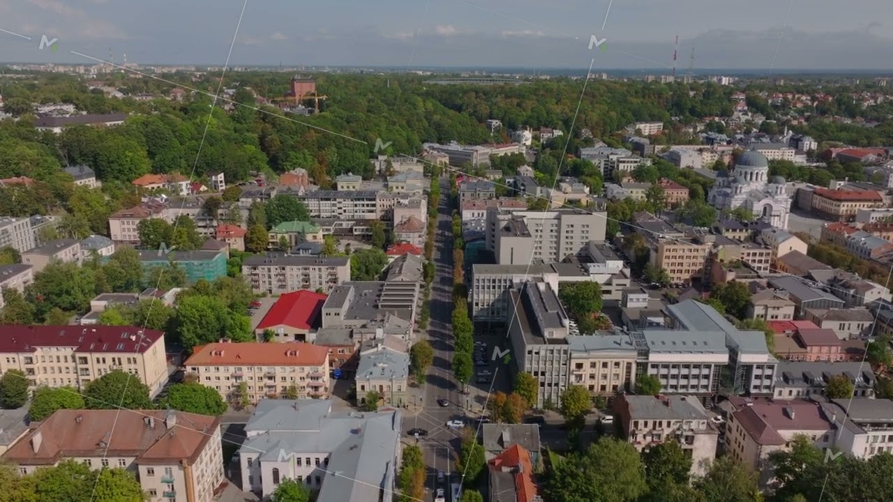 Aerial view of Laisves avenue in Kaunas, Lithuania. The camera is moving forward, offering a