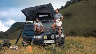 Camping at Chyulu Hills in a Land Cruiser 80 series with a rooftop tent.