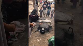 An Afghan immigrant woman baking bread shorts afghanistan ??