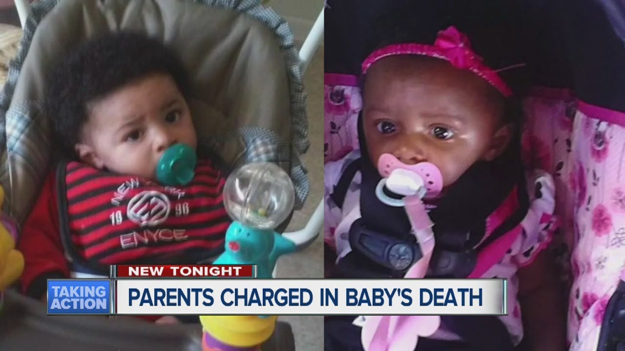 Parents charged in baby's death - YouTube