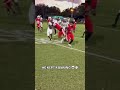 Football player gets helmet ripped off on the run and keeps on going! Wow!
