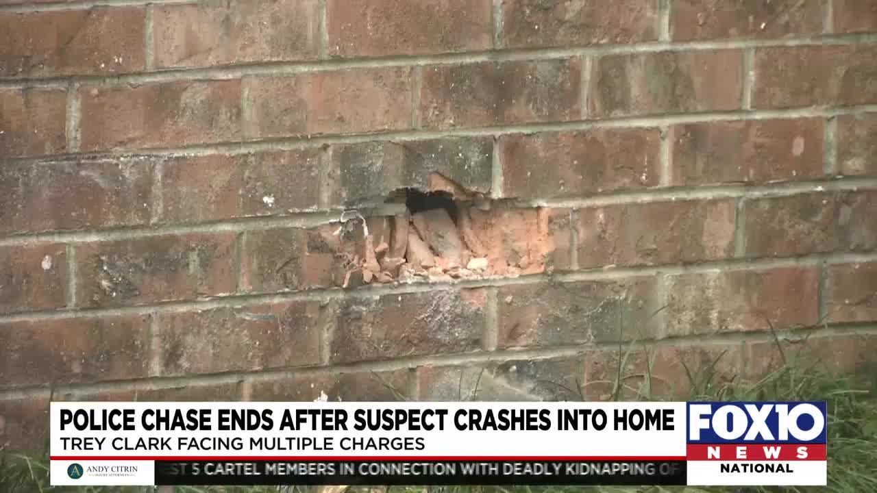Police chase ends after suspect crashes into home - YouTube