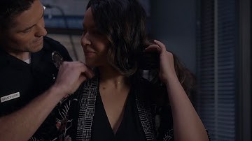 Tim Puts the Necklace on Lucy on The Rookie 5x16 (Feb. 21, 2023)