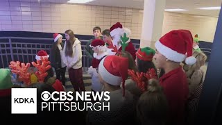 Baldwin High School students help collect toy donations for kids in need.
