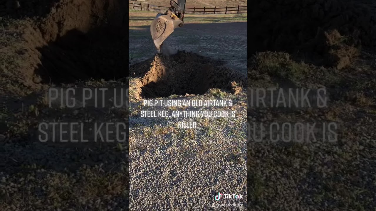 Pig pit using an air tank and steel keg. Bbq.