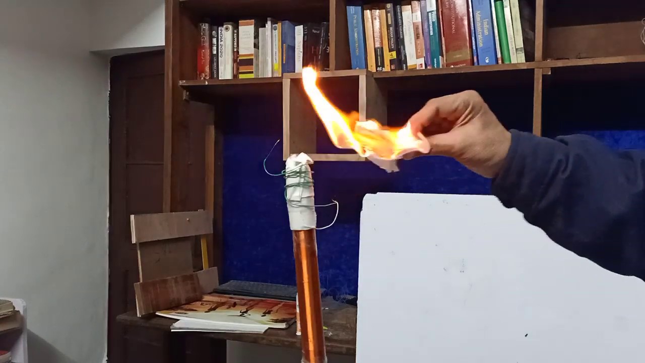 Power of resonance16 volt input Tesla coil arc burning tissue paper