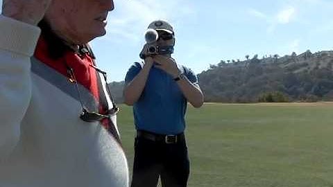 Phil Rodgers teaching Steve Elkington in Fairway