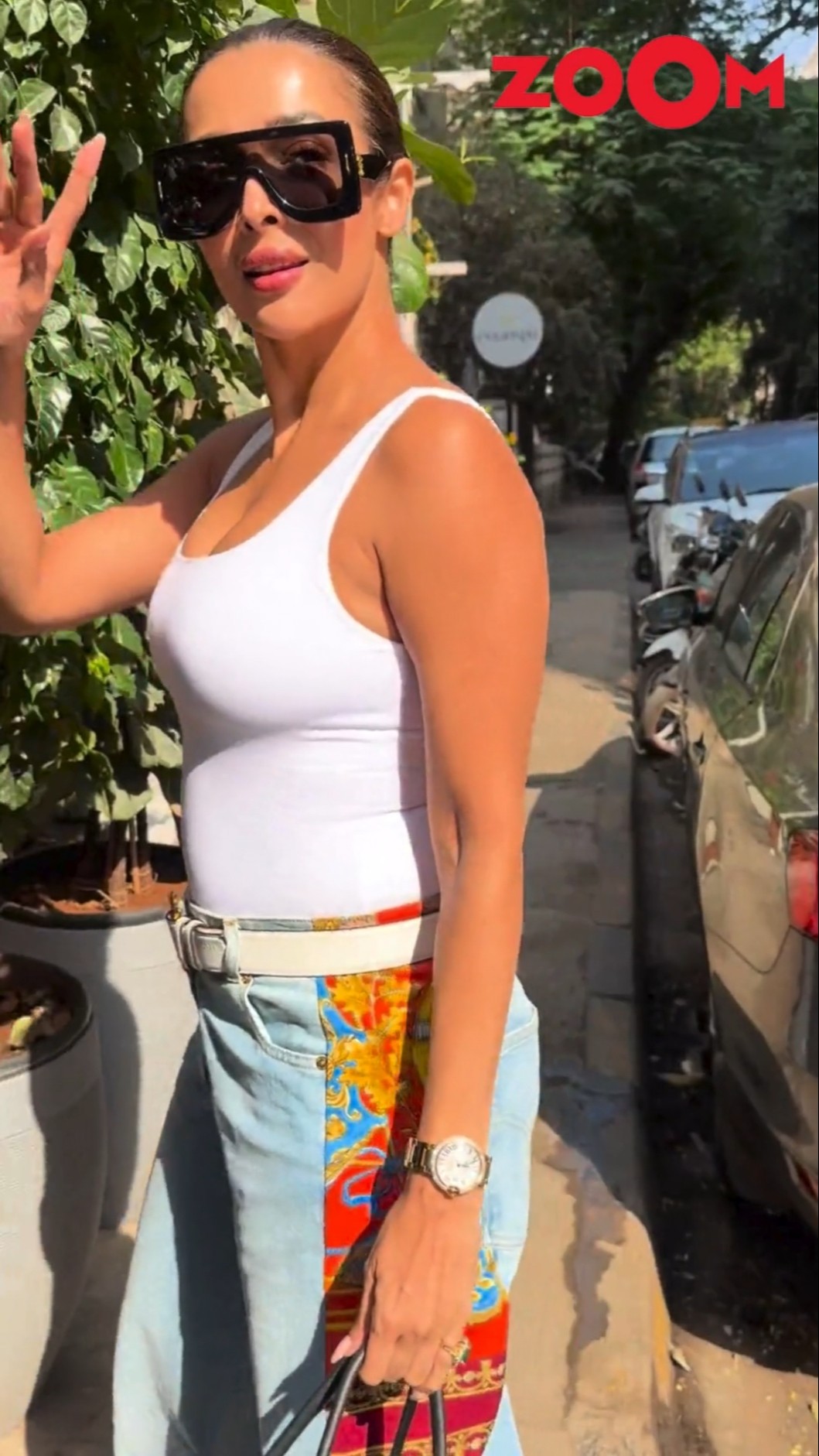 Malaika Arora's simple yet CASUAL look game is STRONG with chunky sunglasses #malaikaarora #shorts