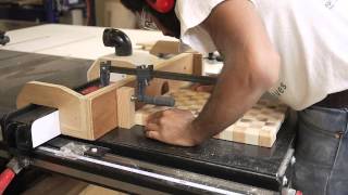 Cutting juice grooves and rounded edges on an end grain cutting board.