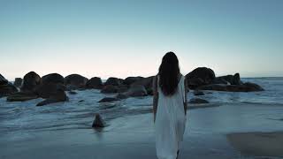 A Girl Walking In Beach