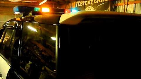 2004 Saturn Vue with Whelen Edge 9000 Black and White