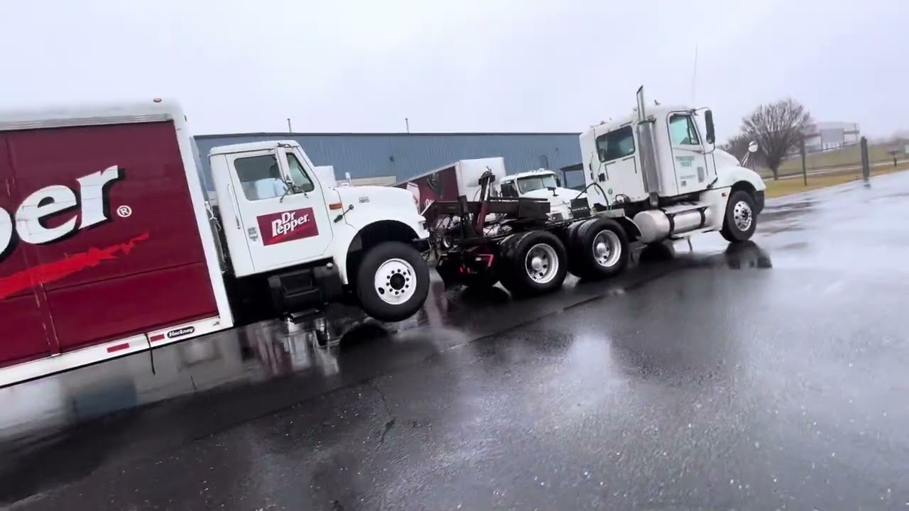 Towing a Dr Pepper truck to the junk yard with the Freightliner ￼