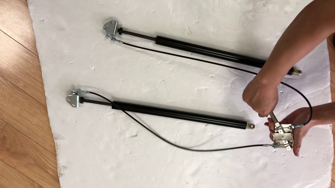 Lockable gas spring controlled by one switch YouTube