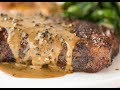 Steak with creamy peppercorn sauce