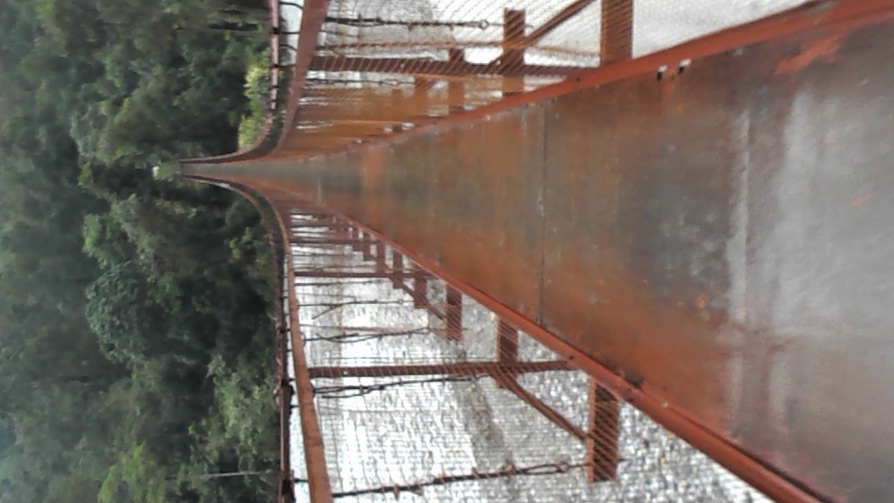The hanging bridge over Mantam Lake on the way to Tingvong village, Upper Dzongu, North Sikkim