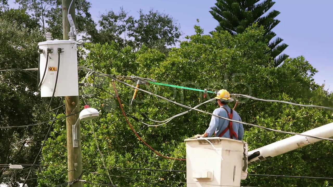 Man Working On Power Lines From A Bucket Lift. Stock Footage YouTube