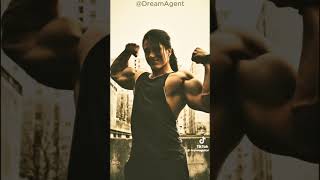 Big Strapping Teen Girl Flexing Huge Biceps