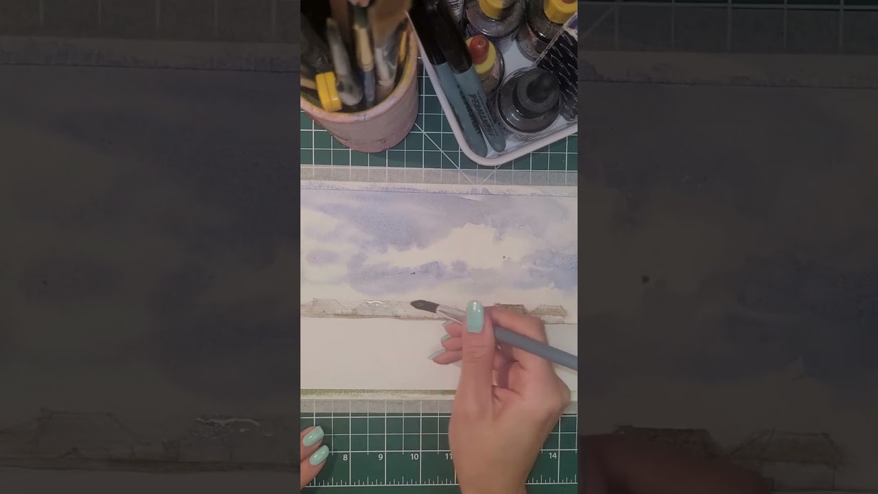 Simple landscape with a cloudy sky in watercolor! 