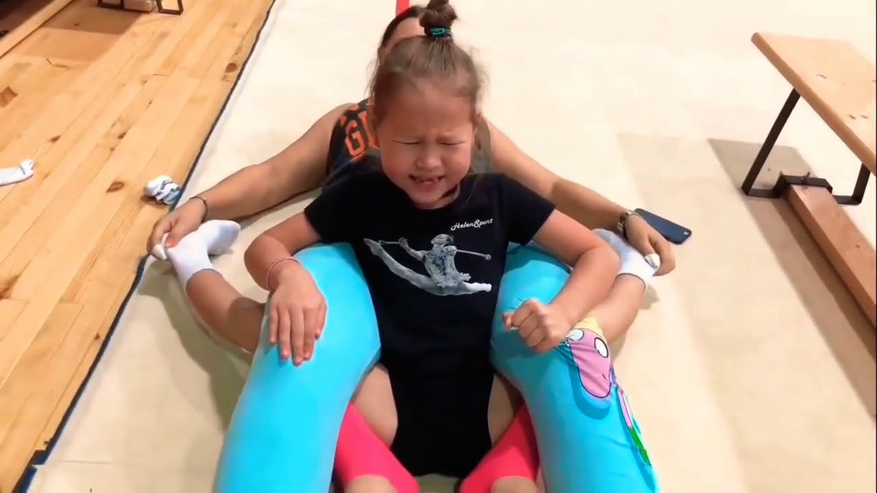 russian kids gymnastics Velislava's first time crying during sadistic gymnastic stretching - YouTube