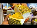 Thai street food - giant durian fruit cutting