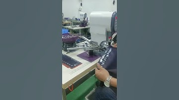 Automatic snap button punching attaching machine