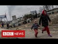 Children flee under fire as Russians advance on Kyiv - BBC News