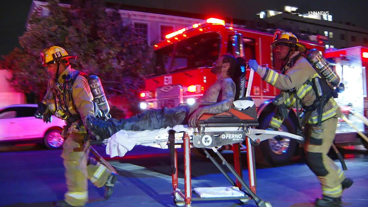 Firefighters Rescue Man in Critical Condition From Burning Building in ...