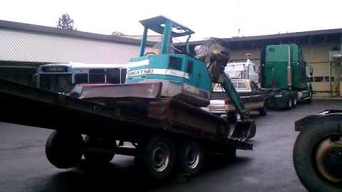 Unload an excavator with no ramps