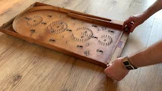 Vintage Bagatelle game forerunner to modern pinball