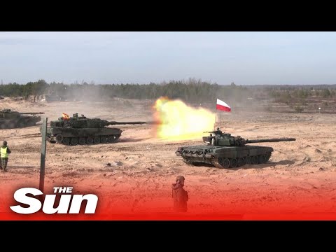 NATO allies carry-out military drills in armoured tanks in Latvia