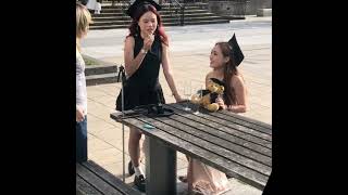 Girls Smoking and Posing at their Graduation