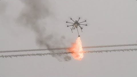 Drones Used to Remove Ice Coatings from Power Lines in Southwest China