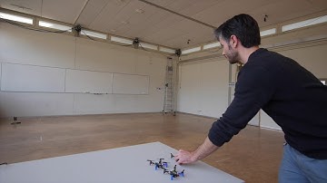 Self-calibrating ultra-wideband network supporting multi-robot localization