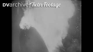 1937 - The Hindenburg bursts into flames