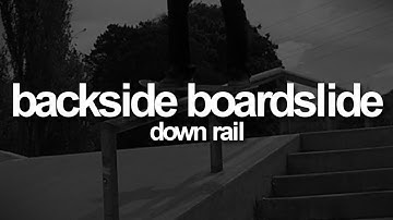 Backside Boardslide Down-Rail: First-Person Skateboarding.