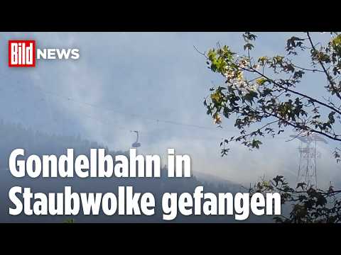 ALPEN-ALARM: Gewaltiger Felssturz an der Zugspitze hüllt Bahn in riesige Staubwolke