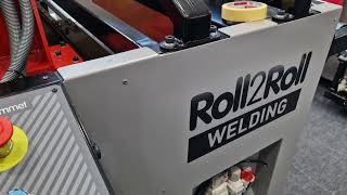 PLASTGrommet | Roll2Roll Welding - FESPA - Automatic welding on both sides of a roll