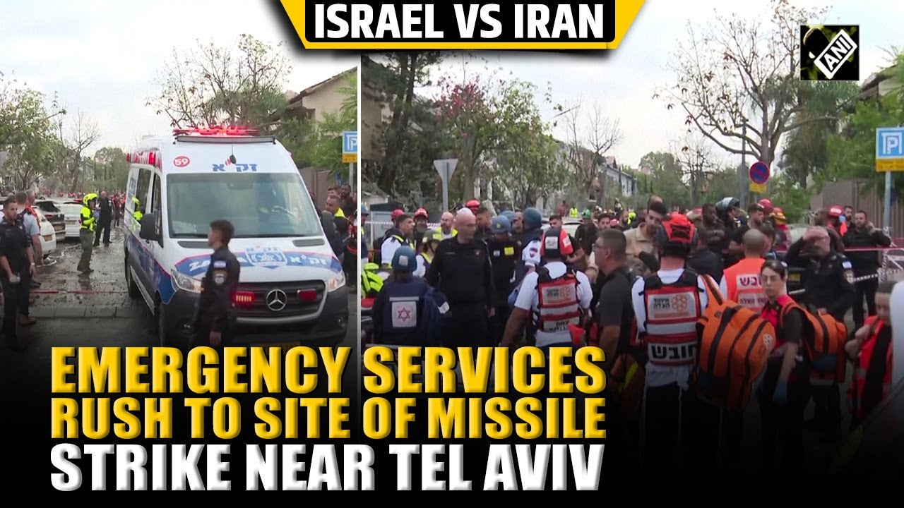 Emergency services rush to site of missile strike near Tel Aviv after barrage fired from Iran
