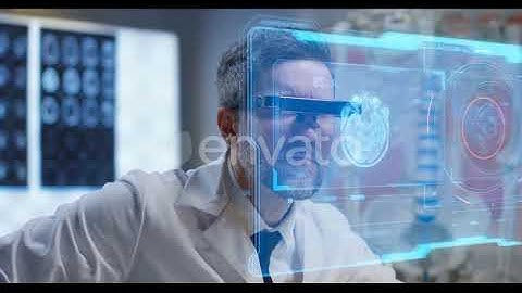 Doctor Using Holographic Display for Research | Stock Footage - Envato elements