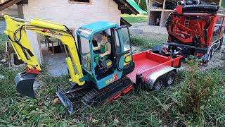 Water pipe installation. Yanmar B37V Erne-Fant suction excavator, RC Scale models