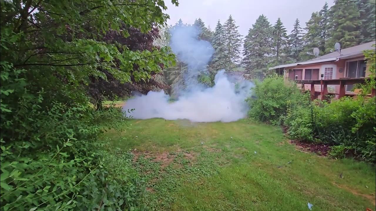 blowing up a plastic container with a block buster , m80 , firecrackers