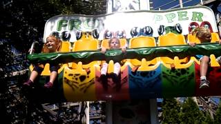 Olivia rides frog hopper at cedar point