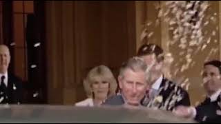 Prince Harry throwing confetti at King Charles at Camilla's wedding