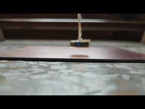 Pendulum magnet induces Eddy currents, comes to rapid halt