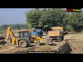 Jcb loader machine loading soil in tipper  two loader machine loading soil
