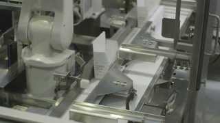 Robotic vial packaging system